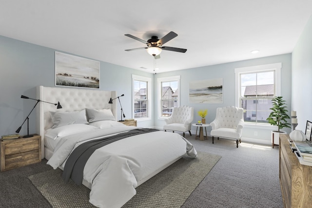 bedroom featuring ceiling fan and carpet flooring