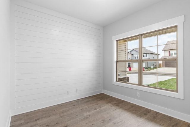 empty room featuring hardwood / wood-style floors