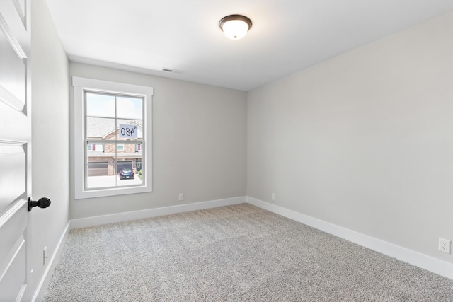 unfurnished room with carpet