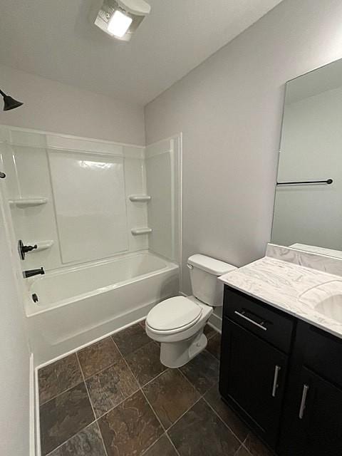 full bathroom with vanity, bathing tub / shower combination, and toilet