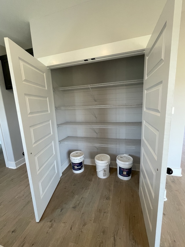 interior space with hardwood / wood-style floors