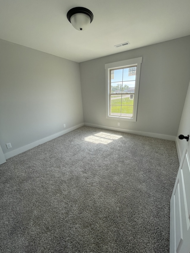 spare room with carpet flooring