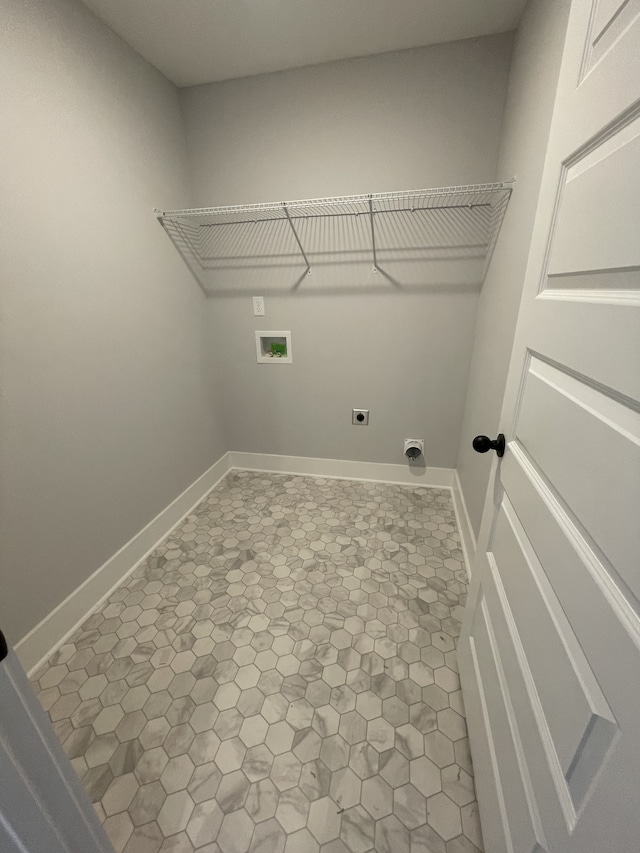 laundry room with hookup for a washing machine and hookup for an electric dryer