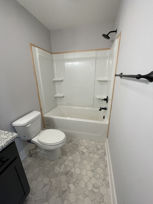 full bathroom with vanity, toilet, and washtub / shower combination