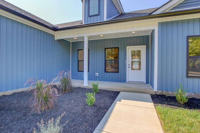 entrance to property with covered porch