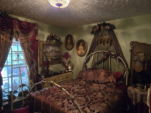 bedroom featuring a textured ceiling