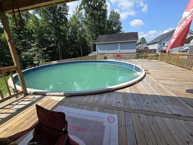 view of pool with a deck