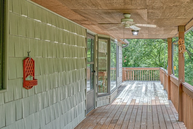 wooden deck with ceiling fan