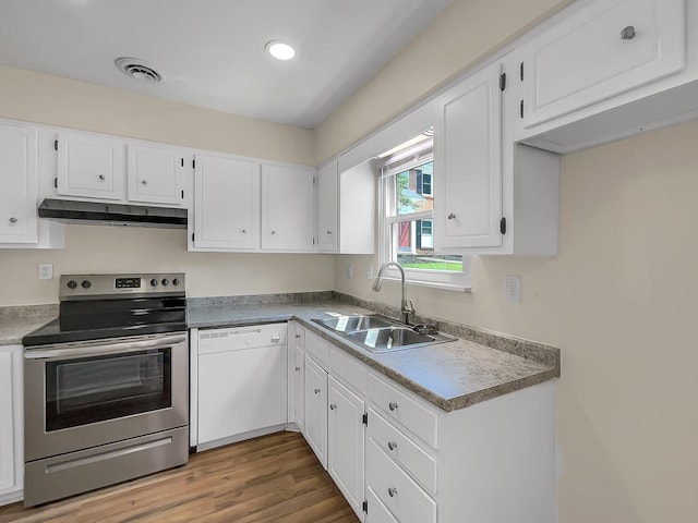 kitchen featuring white cabinetry, dishwasher, sink, and stainless steel electric range