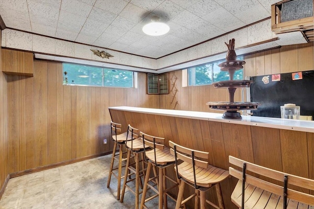 bar with wood walls and refrigerator