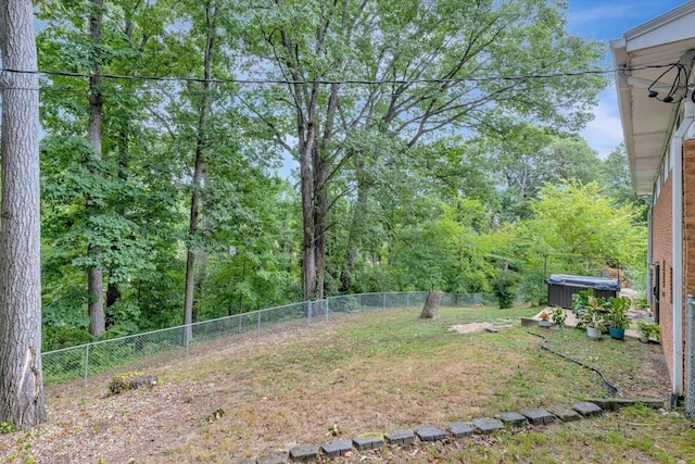 view of yard featuring a hot tub