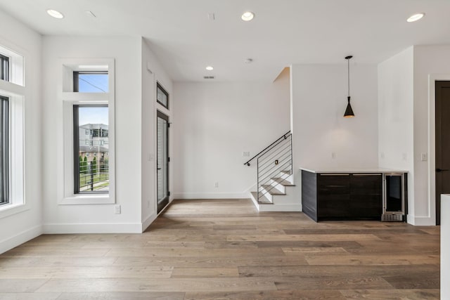 foyer with light hardwood / wood-style floors