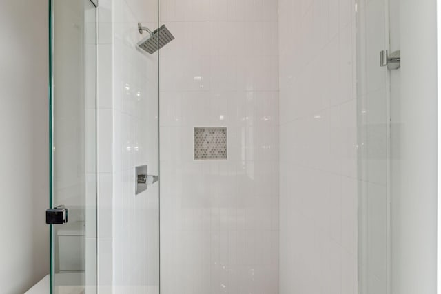 bathroom featuring walk in shower