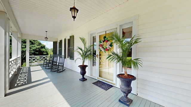 wooden deck with a porch