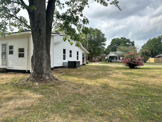 view of yard featuring central AC