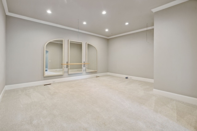 carpeted empty room with ornamental molding