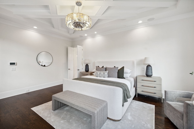 bedroom featuring beam ceiling, crown molding, and dark hardwood / wood-style flooring