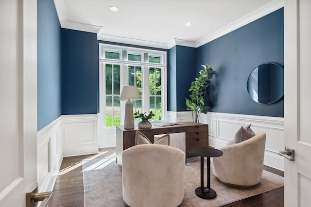 sitting room featuring ornamental molding and dark hardwood / wood-style flooring