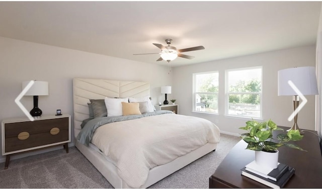 bedroom with ceiling fan and dark colored carpet