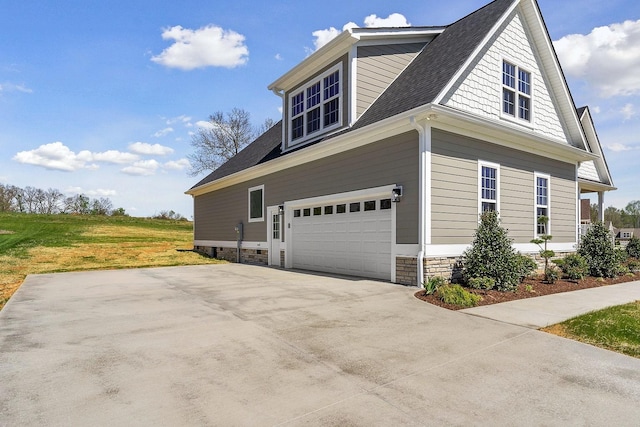 view of side of property with a garage