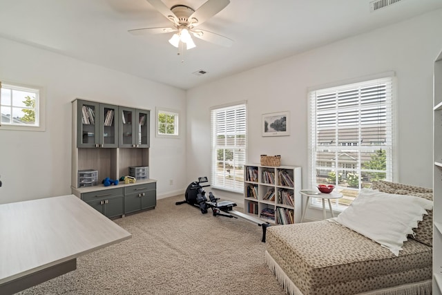 interior space featuring ceiling fan