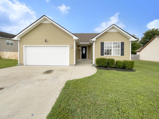 ranch-style house with a garage and a front yard