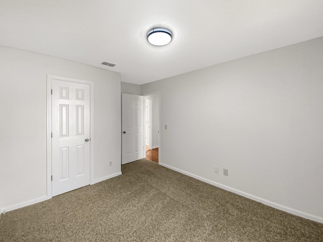 unfurnished bedroom featuring carpet