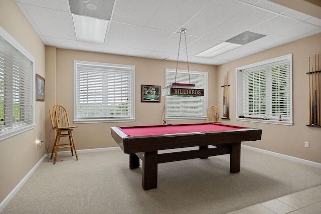 playroom featuring carpet floors, a wealth of natural light, and a paneled ceiling