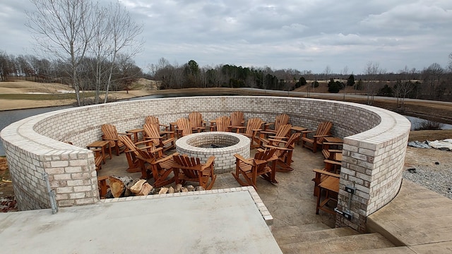 view of patio featuring a fire pit