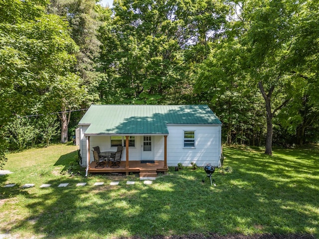 view of outdoor structure with a lawn