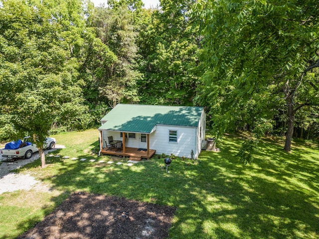 exterior space with a yard and a porch