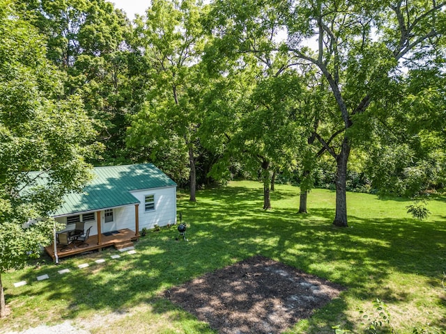 view of yard with a wooden deck