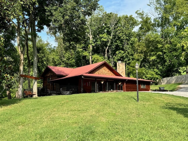 exterior space featuring a lawn