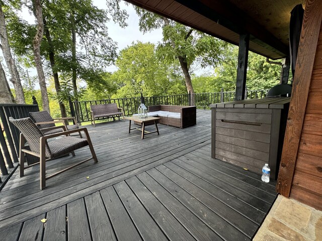 wooden deck with an outdoor hangout area