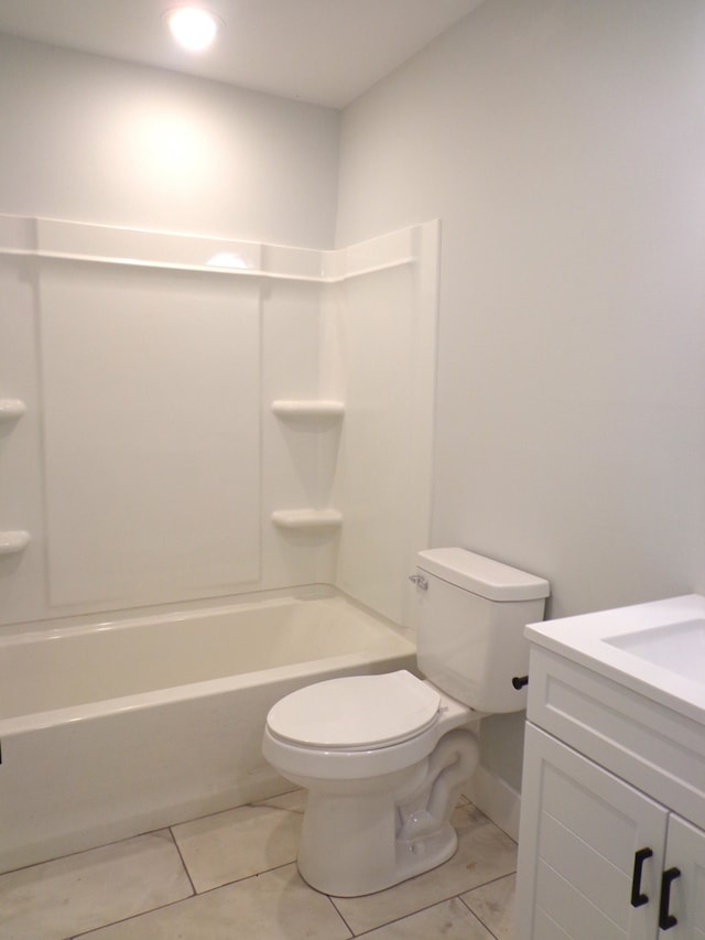 full bathroom with tile patterned flooring, vanity, toilet, and  shower combination