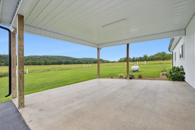 view of patio / terrace with a rural view