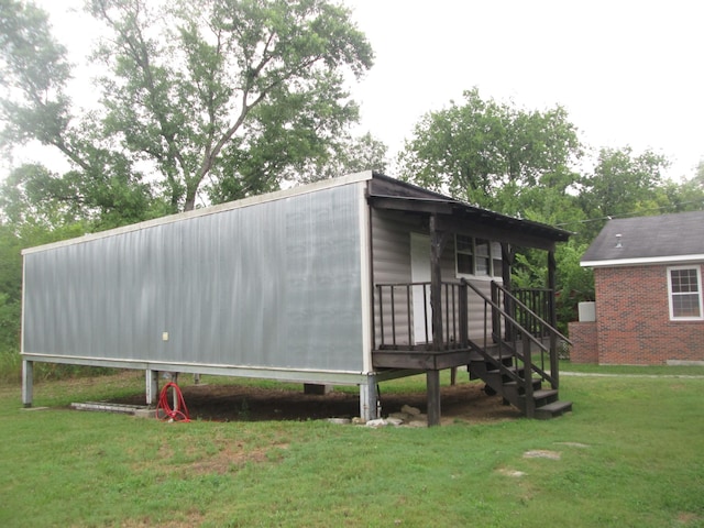 view of property exterior with a yard