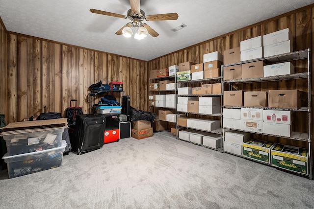 storage area featuring ceiling fan