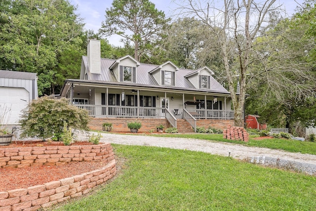 view of front facade featuring a porch and a front yard