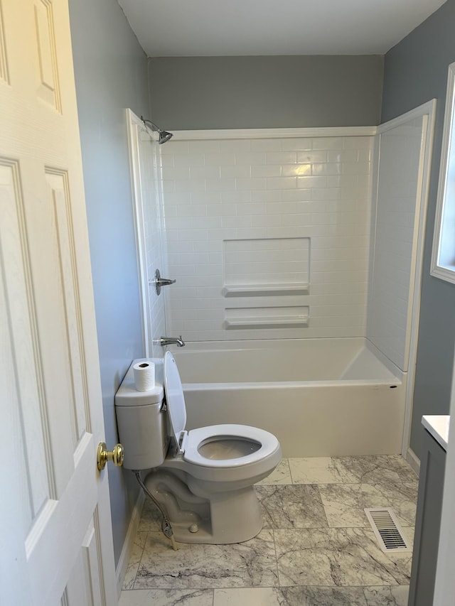 full bathroom with toilet, vanity, and tub / shower combination