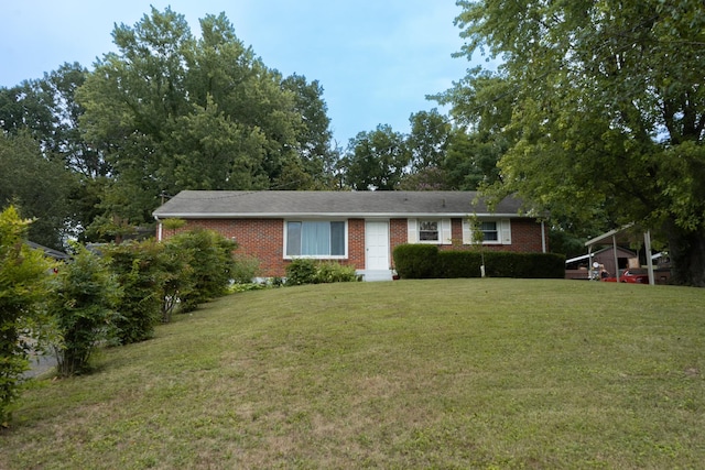 single story home featuring a front yard