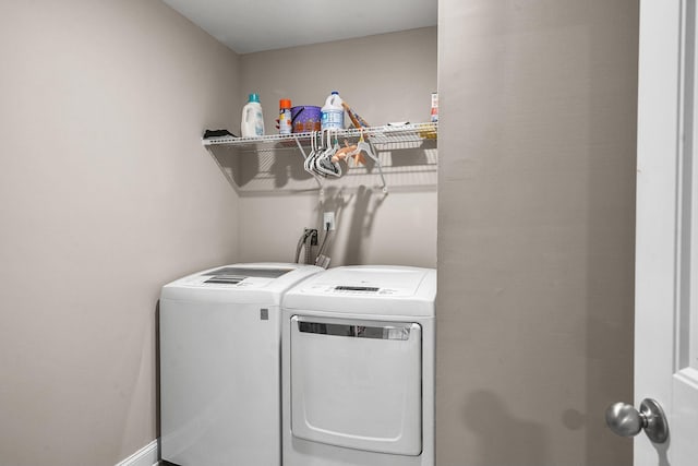 laundry room featuring washer and clothes dryer