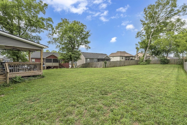 view of yard featuring a wooden deck