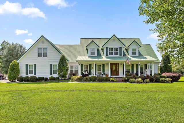 view of front of house featuring covered porch and a front lawn