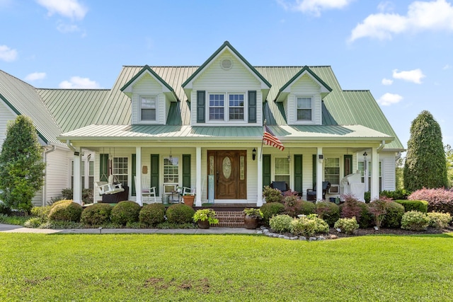 view of front facade featuring a front lawn and covered porch