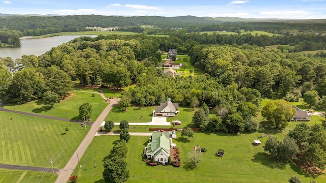 drone / aerial view featuring a rural view and a water view