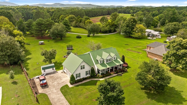 birds eye view of property featuring a mountain view