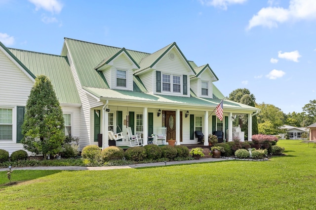 view of front of home featuring a porch and a front lawn