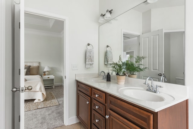 bathroom featuring dual vanity and toilet