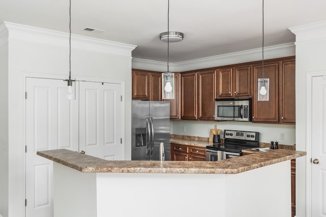 kitchen with pendant lighting, crown molding, appliances with stainless steel finishes, and light stone counters